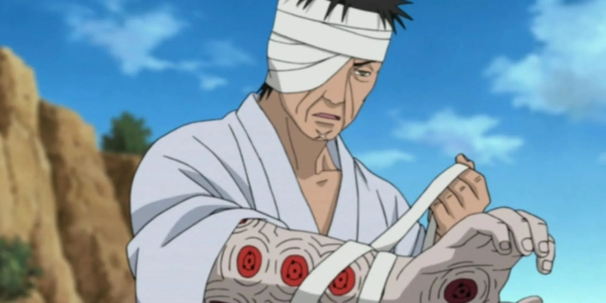 Danzo Shimura, thủ lĩnh Anbu Gốc, kiến trúc sư của nhiều thảm kịch tại Konoha, bao gồm vụ thảm sát gia tộc Uchiha