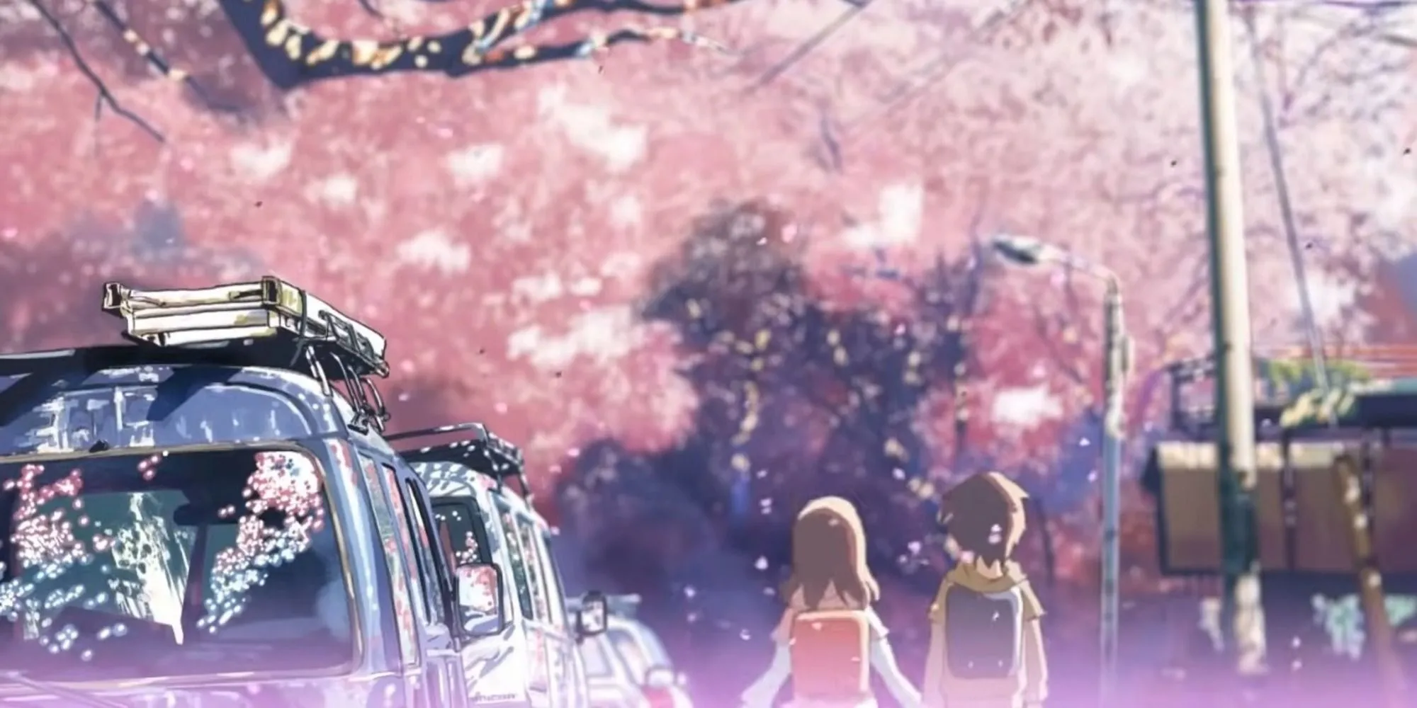 Takaki Toono và Akari Shinohara trong cảnh tuyết rơi từ phim 5 Centimeters Per Second