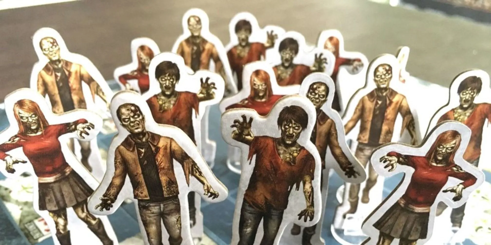Các token zombie trong board game Dead of Winter, tượng trưng cho mối hiểm họa