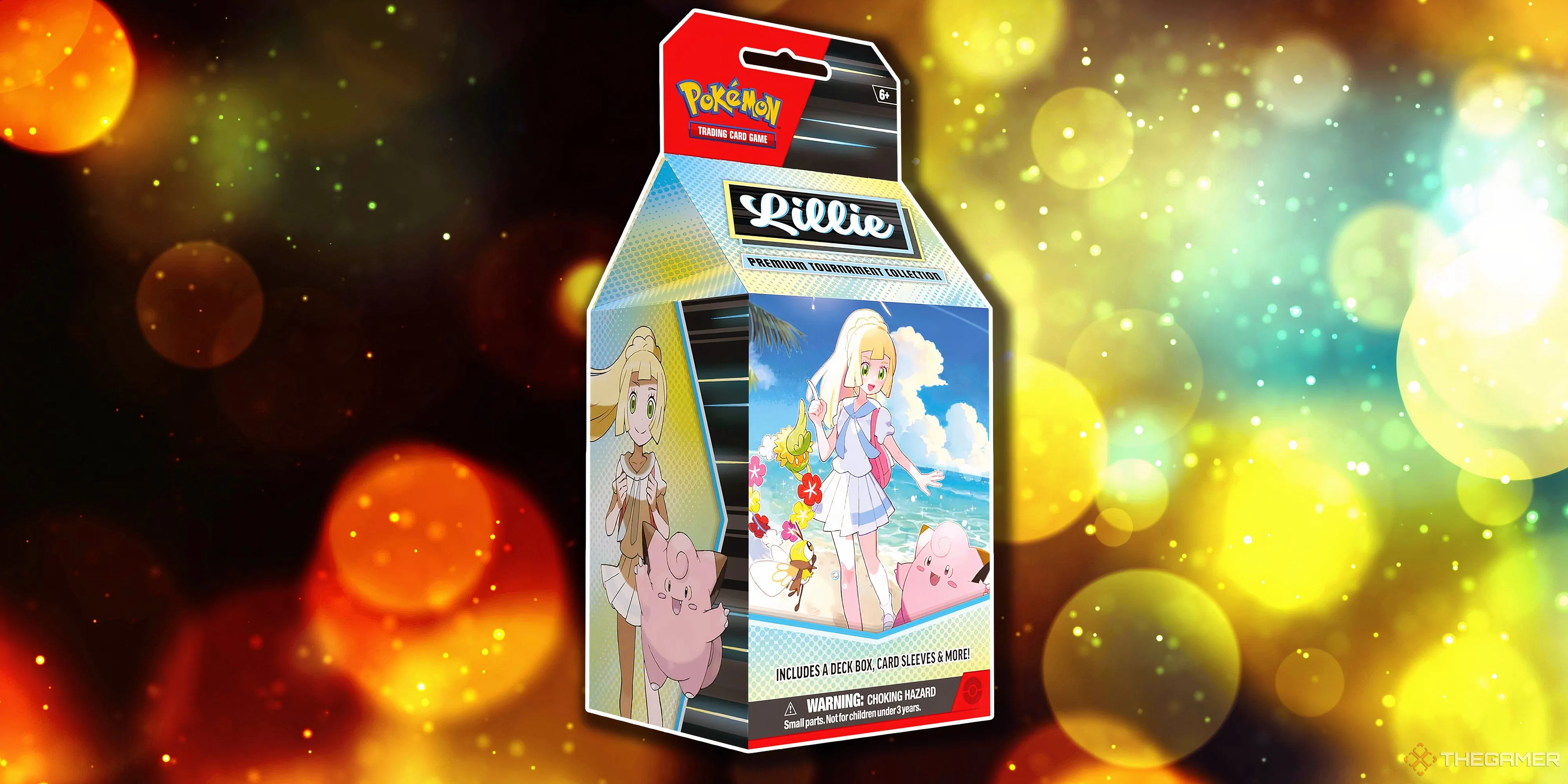 Hộp Premium Tournament Collection Lillie với hình ảnh cô gái tóc vàng Lillie và Pokémon Cosmog đáng yêu.