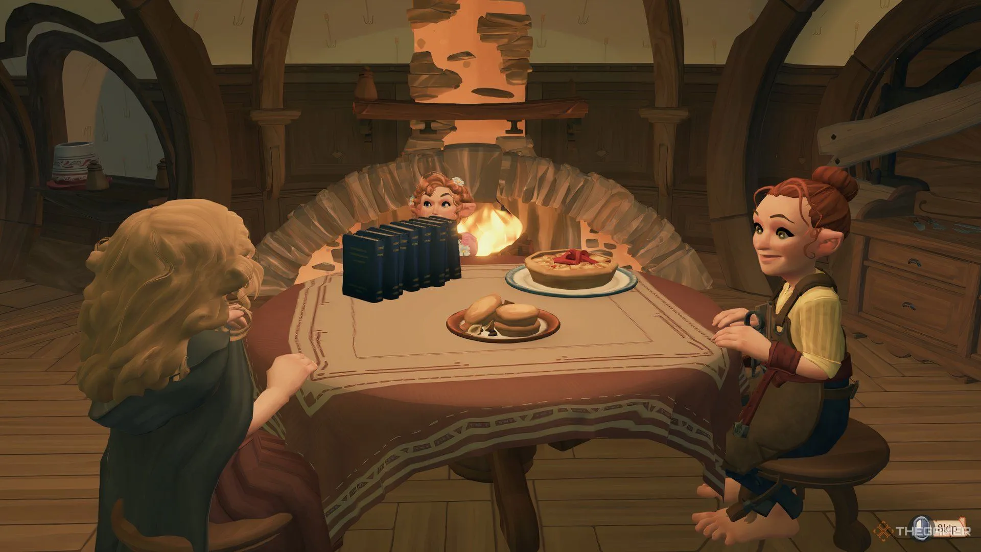 Một bữa ăn chung đang diễn ra trong Tales of the Shire, với nhiều người Hobbit đang thưởng thức đồ ăn.