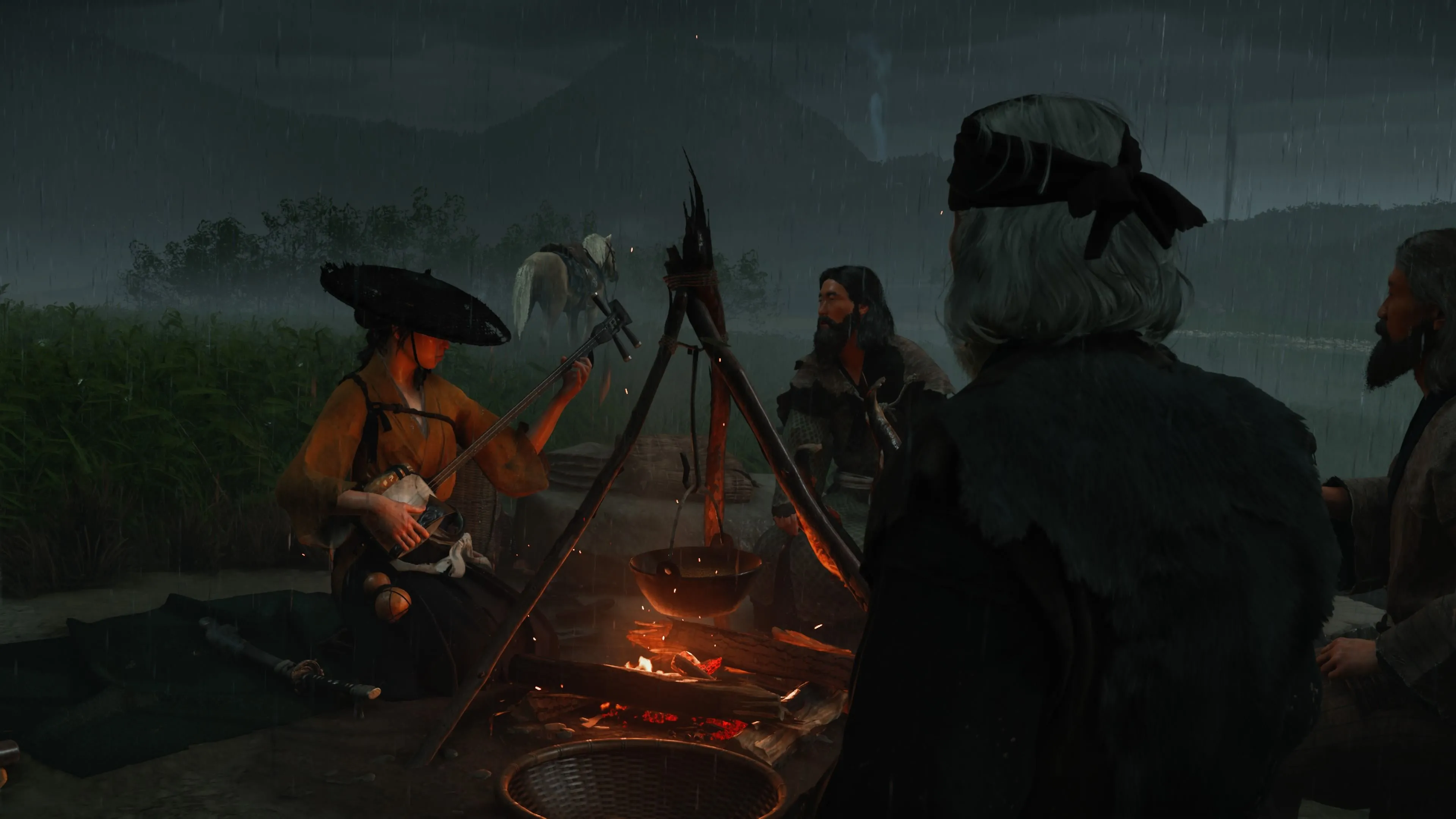 Atsu nghỉ bên lữ khách trên đường mòn, thế giới Yotei giàu chi tiết và tương tác