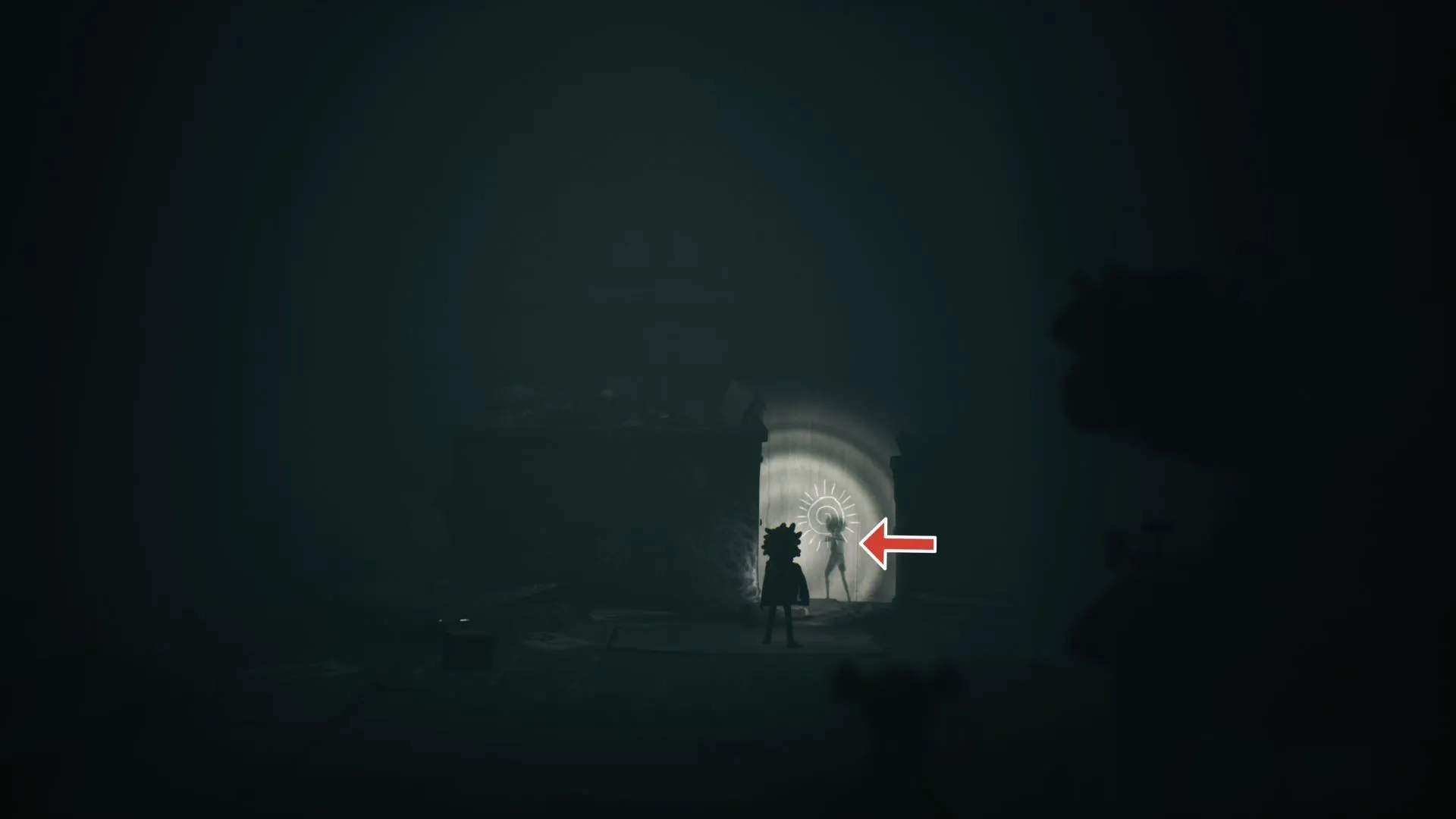 Ma #2 vẽ trên tường giữa thùng rác và dumpster