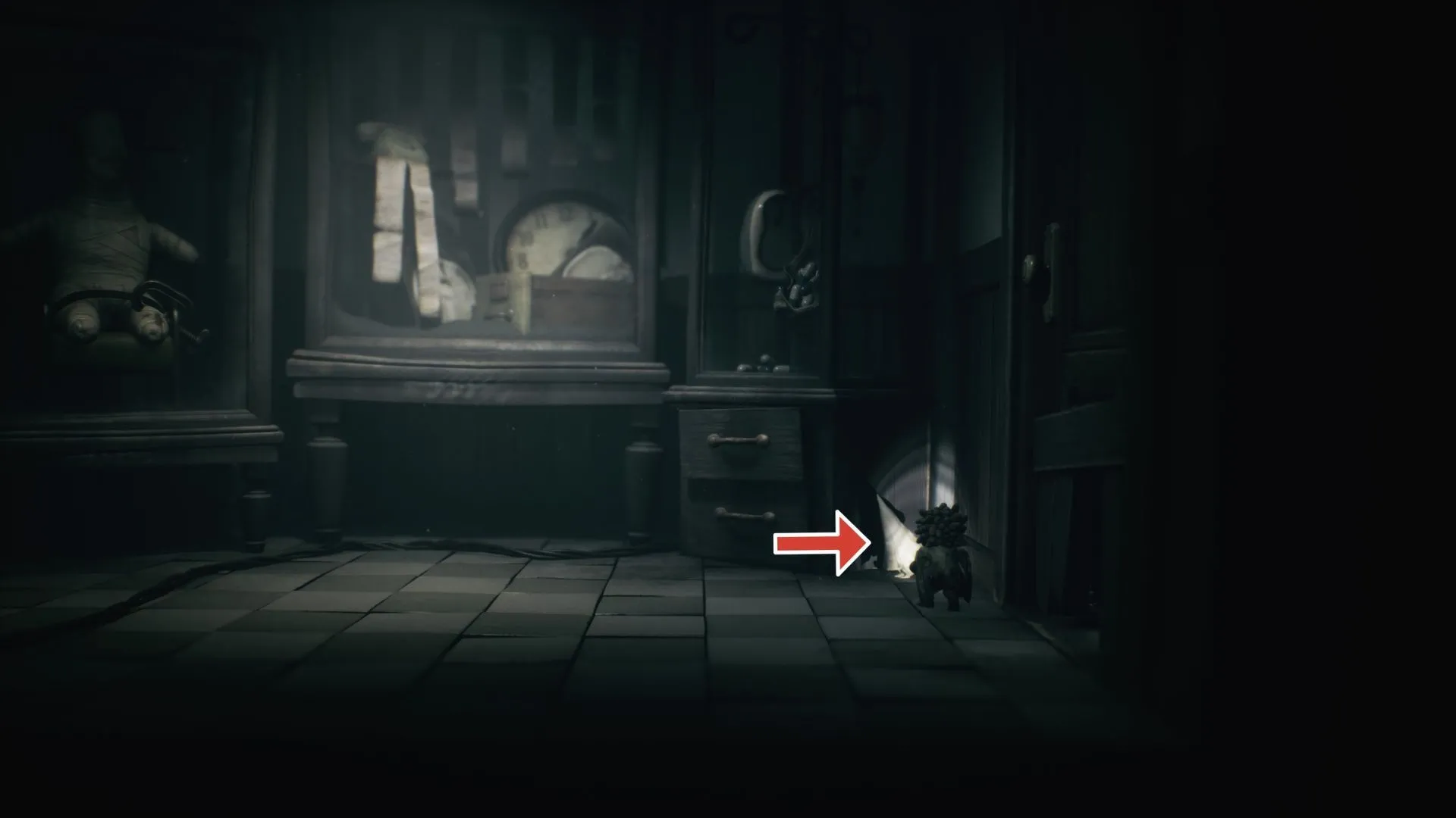 Nome thứ tư xuất hiện sau khi mở tủ bên trong phòng búp bê Little Nightmares 3