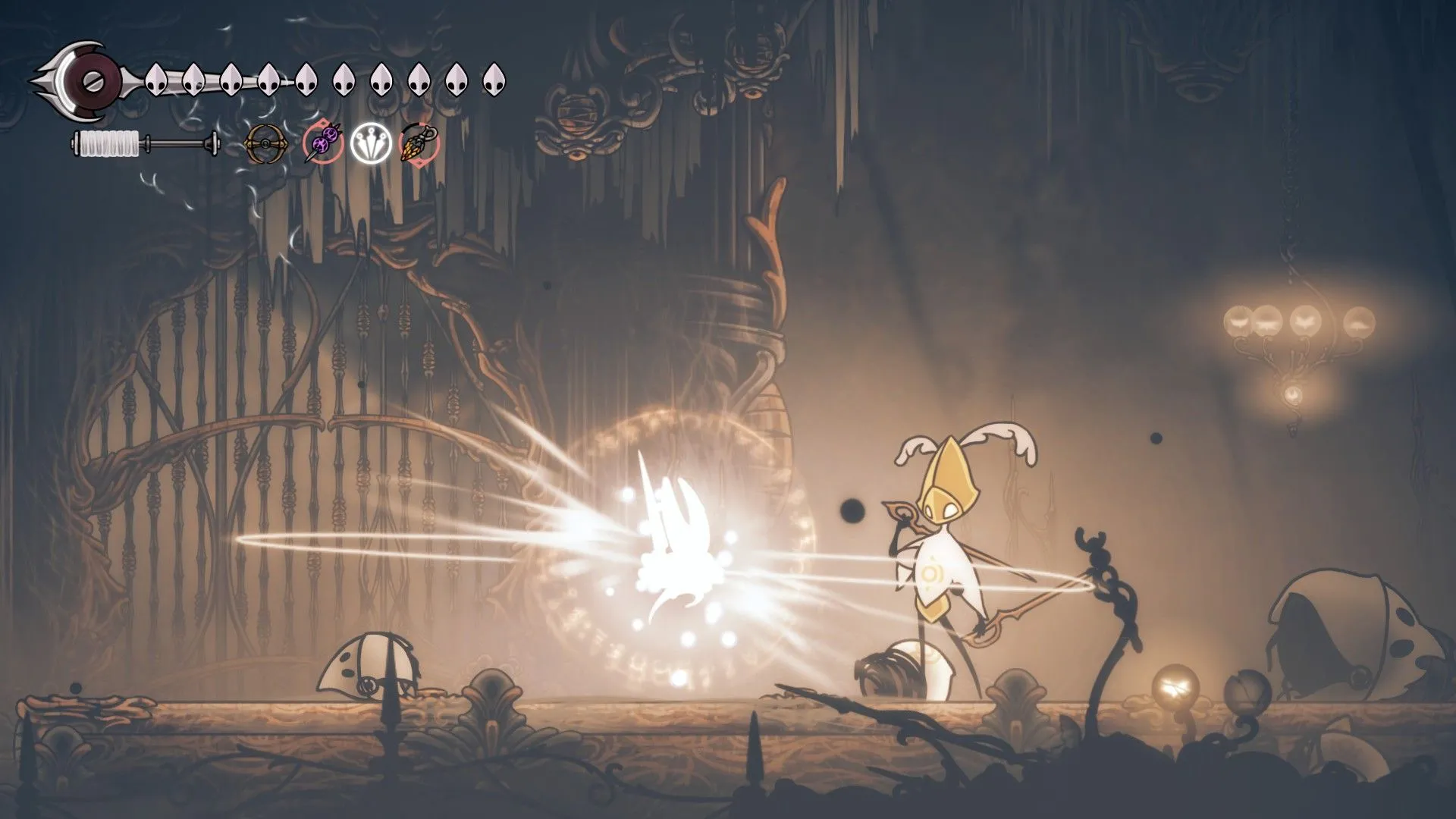 Sử dụng Injector Band để hồi máu trong Silksong — ví dụ về hệ thống vật phẩm và chiến đấu đa dạng